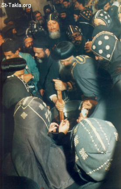 St-Takla.org Image: Pope Shenouda III and the Coptic Bishops preparing the Holy Mairoun Oil (Chrism)     :            