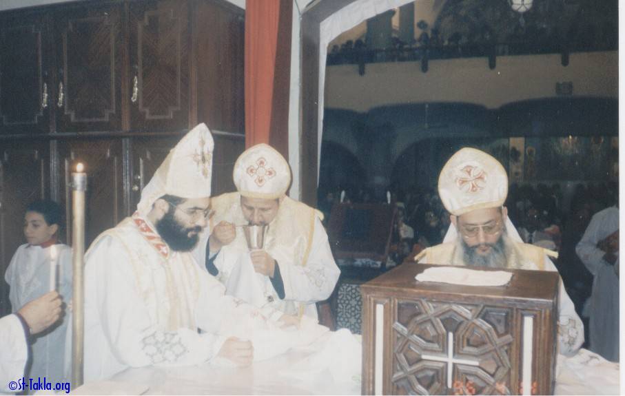 St-Takla.org Image: Coptic Priests of St. Takla Haymanot Church inside the Holy Altar     :       