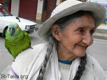 St-Takla.org Image: An old woman with a parrot     :     