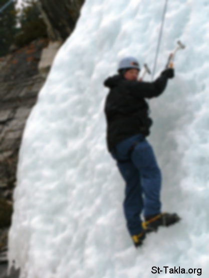 St-Takla.org Image: Man climbing an ice mountain     :    