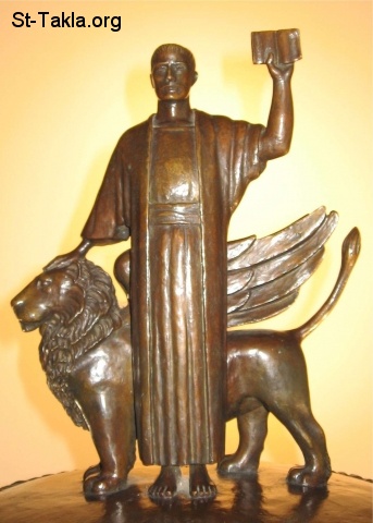 St-Takla.org         Image: St Mark & lion, wooden statue صورة: القديس مرقس والأسد، نحت على الخشب